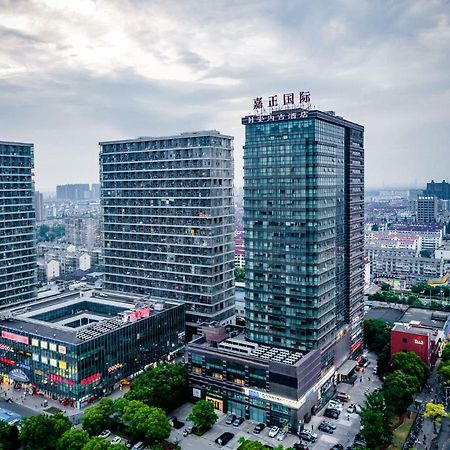Jiazheng International Energy Hotel Huaqiao  Bagian luar foto