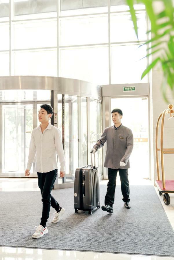 Jiazheng International Energy Hotel Huaqiao  Bagian luar foto